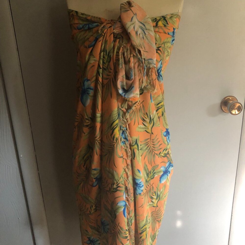 Cover up sarong in orange flower print. One size